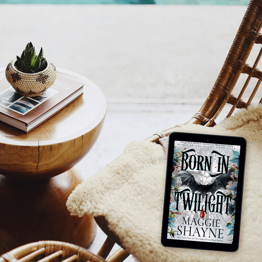 Maggie Shayne's Born in Twilight lifestyle 4 ebook on wicker chair and blanket, table with books and cactus