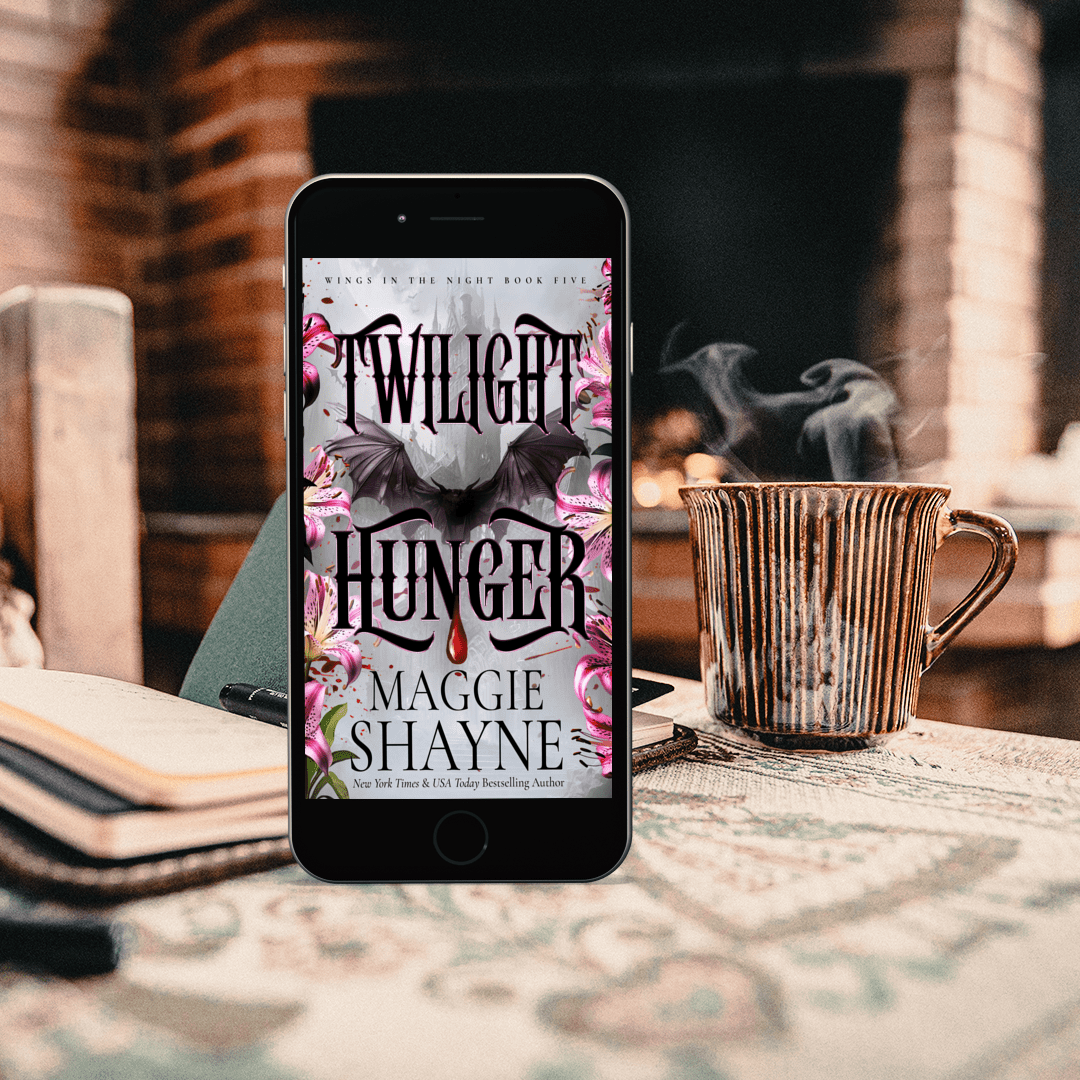 Maggie Shayne's Twilight Hunger Lifestyle 1 phone standing up on table with coffee cup and fireplace in background