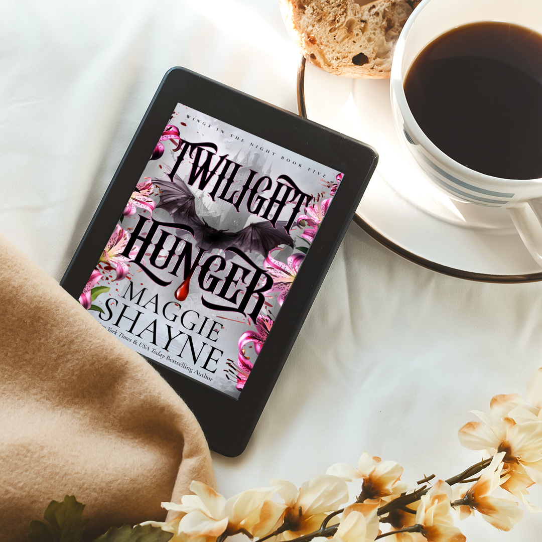 Maggie Shayne's Twilight Hunger Lifestyle 5 on white surface with flowers, and tea cup and scone