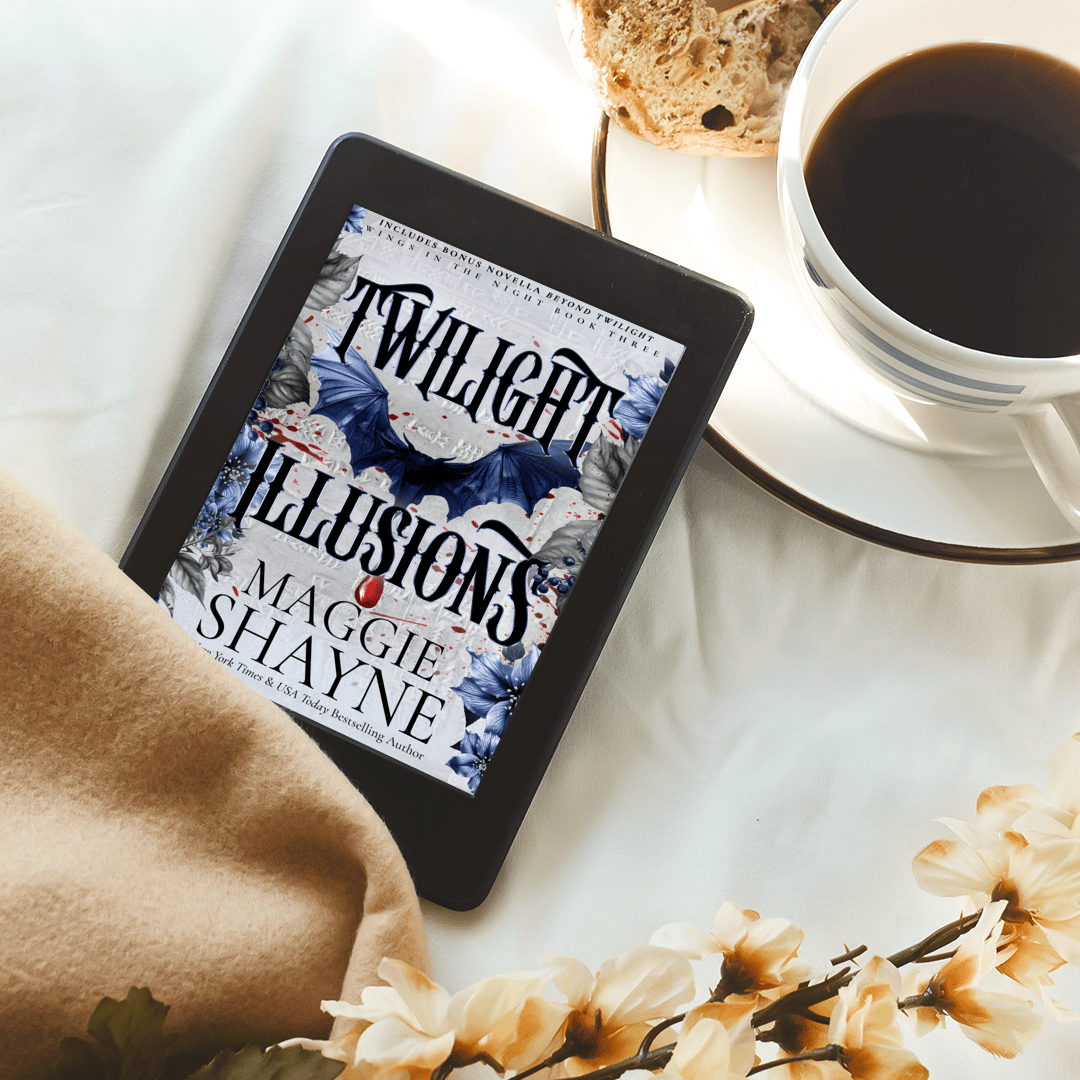 Maggie Shayne's Twilight Illusions lifestyle 1 table with teacup, scone, flowers, blanket