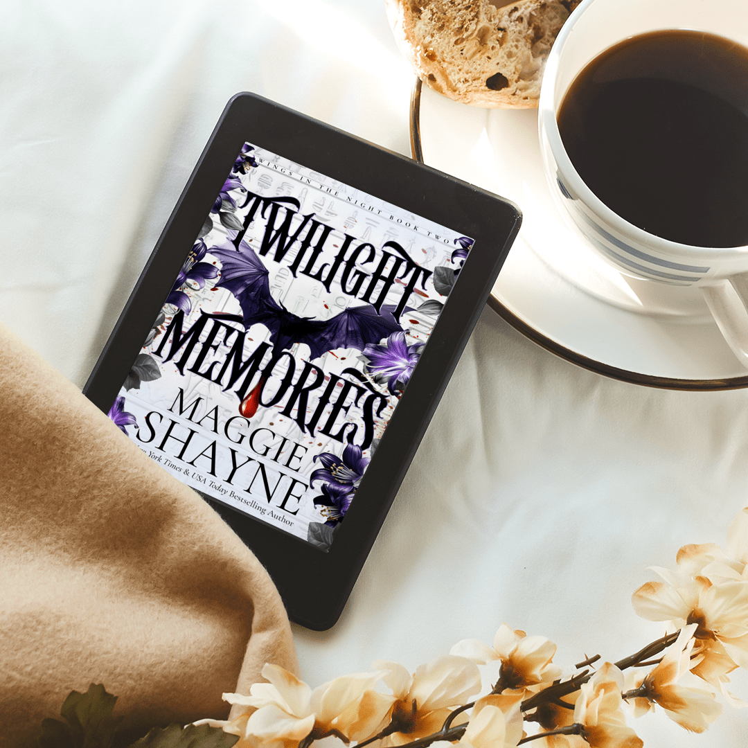 Maggie Shayne's Twilight Memories Lifestyle 1 table with teacup, scone, flowers, blanket