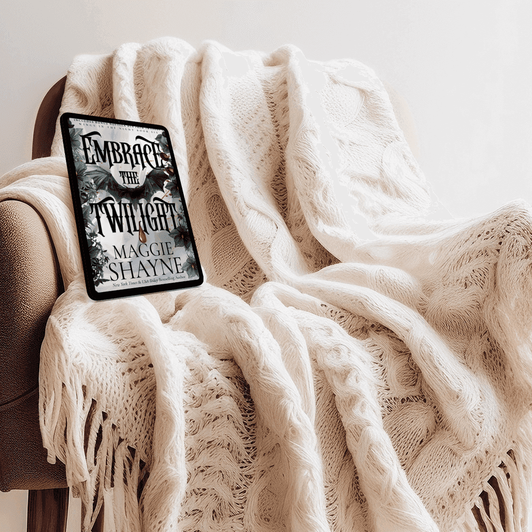 Maggie_Shayne_s_Embrace_the_Twilight_Lifestyle_2 knitted blanket draped over chair with ereader propped up